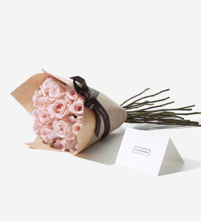 20 Pink Mondial rose stems wrapped in our signature gift wrapping. Available at checkout.