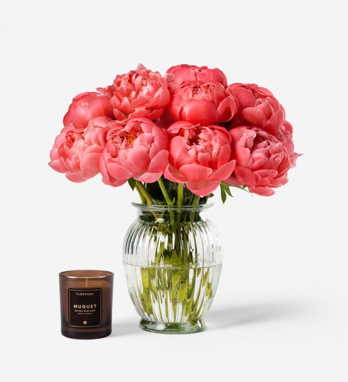 10 stems of Flamingo Peony in a Royal Windsor Vase with our Muguet Candle