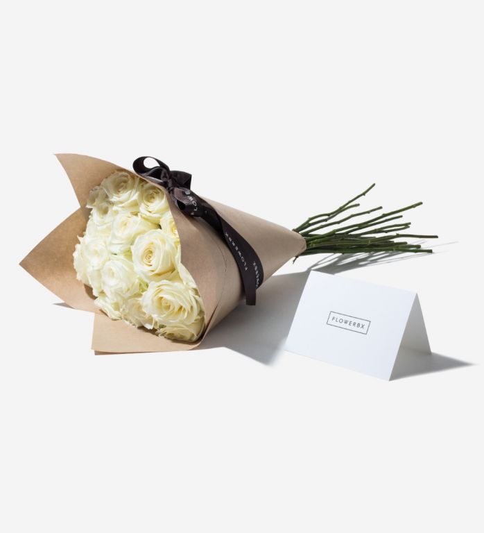 20 Stems of Ivory Mondial Rose wrapped in our signature gift wrapping