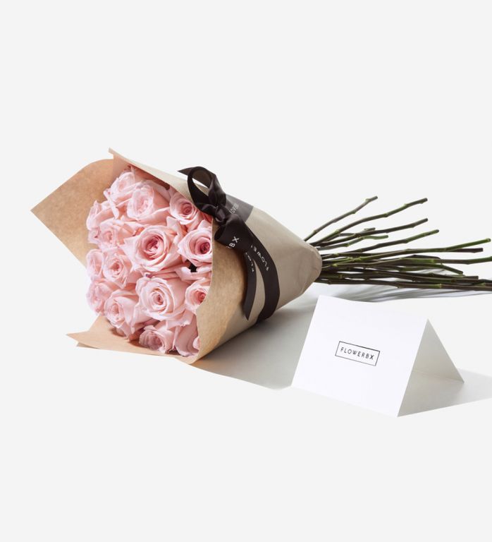 20 Pink Sweet Avalanche rose stems wrapped in our signature gift wrapping. Available at checkout.