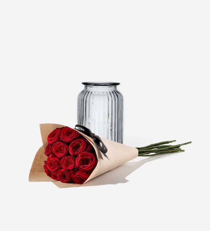12 Red Naomi rose stems wrapped in our signature gift wrapping with Straight Windsor Vase