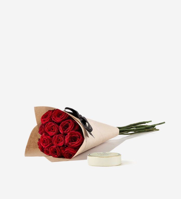 12 Red Naomi rose stems wrapped in our signature gift wrapping with Milk Sea Salt Caramel Chocolate Truffle