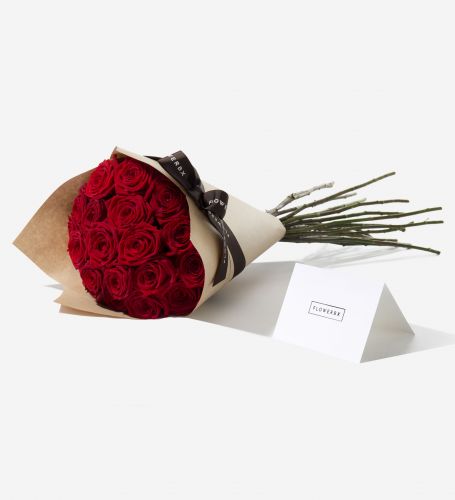 20 Red Naomi rose stems wrapped in our signature gift wrapping. Available at checkout.