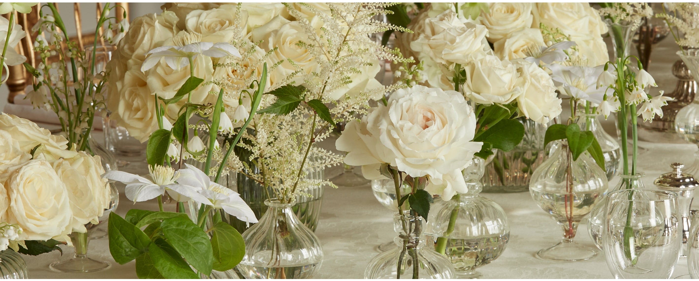 White wedding flowers table display